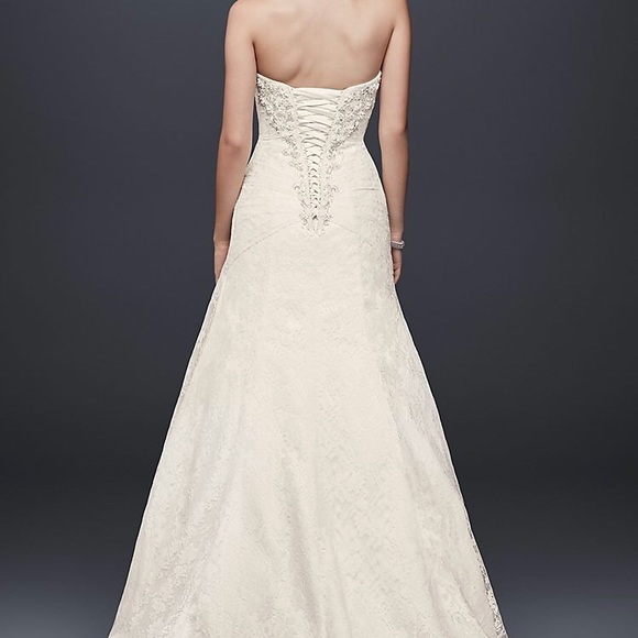 New tags still on wedding dress - Picture 2 of 4